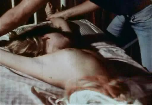 undress woman boobs in the movie The Howling